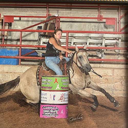 Barrel Racer Kelly Rounds a Barrel